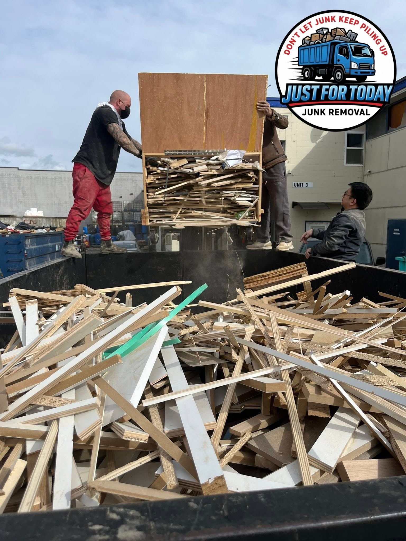 Junk removal crew working safely