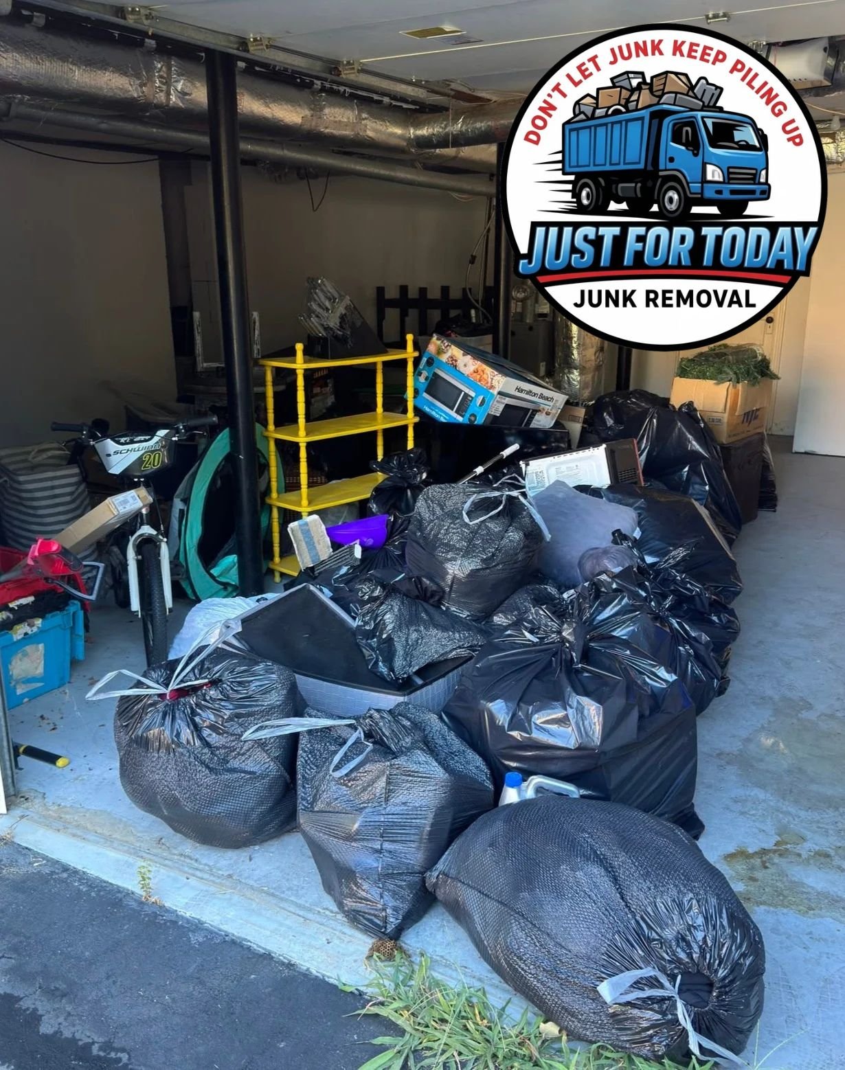 Junk removal team loading items on the truck
